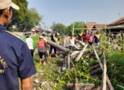 Antisipasi Banjir Pemdes Tanjungbaru dan Warga Gelar Kerja Bakti. Kompak Bersihkan Saluran Irigasi.